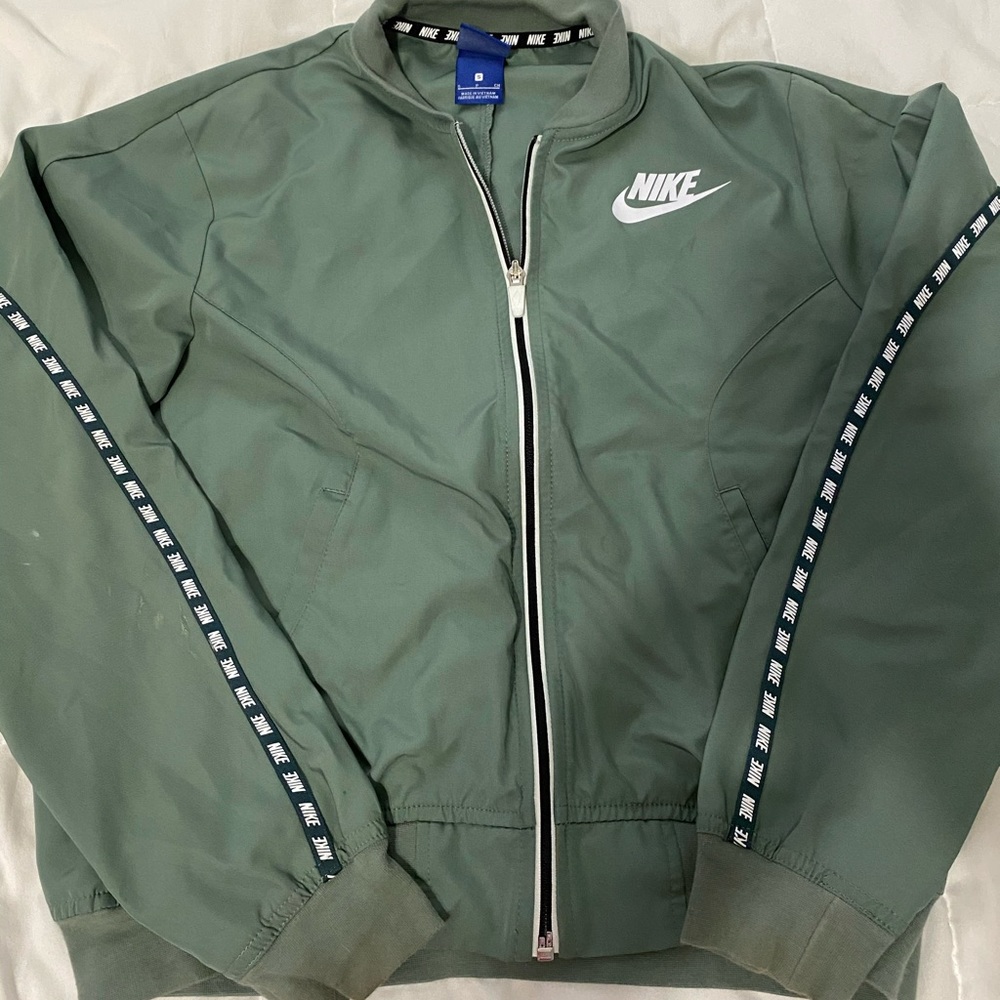 Greenish Nike wind breaker